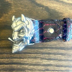 Jeffrey West Mens Leather Belt with Silver “Devil” Buckle. Burgundy Snake Skin